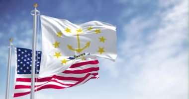 Seamless loop of the Rhode Island state flag waving along with the national flag of the United States of America. Rhode island is a state in the Northeastern United States