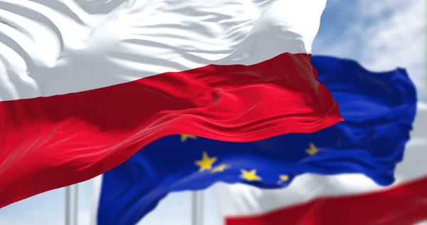 Detail National Flag Poland Waving Wind Blurred European Union Flag — Φωτογραφία Αρχείου