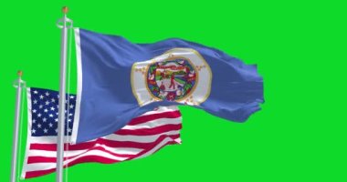 Minnesota eyaletinin bayrağı, Amerika Birleşik Devletleri bayrağıyla birlikte yeşil bir zeminde dalgalanıyor. Minnesota, ABD 'nin orta batısında bulunan bir eyalettir.