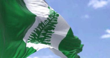 Norfolk Adası bayrağının açık bir günde rüzgarda dalgalanması gibi pürüzsüz bir döngü. Norfolk Adası, Avustralya 'nın Pasifik Okyanusu' nda bulunan bir harici bölgesidir.
