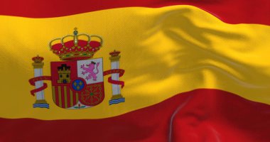 İspanya ulusal bayrağının rüzgarda dalgalanmasını yakından izleyin. Seçici odak.