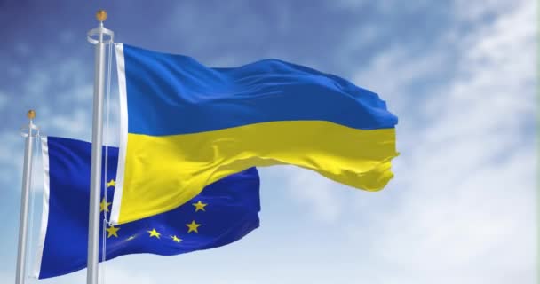 National Flag Ukraine Waving Blurred European Union Flag Clear Day — Stock Video