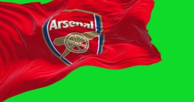 Londra, İngiltere, Mayıs 2022: Arsenal FC 'nin bayrağı yeşil arka planda izole bir şekilde dalgalanırken yavaş çekimde kusursuz döngü. Arsenal, İngiliz profesyonel futbol kulübüdür. Krom anahtar