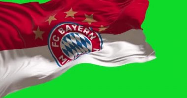 Münih, GER, Mayıs 2022: Bayern Münih bayrağı yeşil arka planda izole edilmiş. Bayern Münih Münih merkezli bir Alman spor kulübüdür. Kusursuz, ağır çekimde döngü