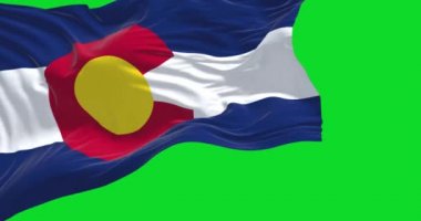 ABD 'nin Colorado eyaletinin bayrağı yeşil arka planda yalıtılmış rüzgarda dalgalanıyor. Colorado, Amerika Birleşik Devletleri 'nin batısında yer alan bir eyalettir. Yavaş çekimde kusursuz döngü