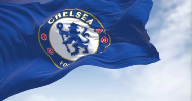 London, UK, May 2022: The flag of Chelsea Football Club waving in the wind on a clear day. Chelsea F.C. is a professional football club based in Fulham, London. Seamless loop in slow motion