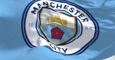 Manchester, UK, May 2022: Fabric background with the Manchester City Flag waving. Manchester F.C. is a professional football club based in Bradford, Manchester. Seamless loop in slow motion
