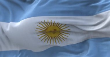 Close-up view of the national flag of the Argentine Republic. Argentina is a South American country. Seamless loop in slow motion