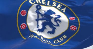London, UK, May 2022: The flag of Chelsea Football Club waving in the wind. Chelsea F.C. is a professional football club based in Fulham, London. Seamless loop in slow motion