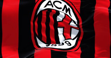 Milan, Italy, July 2022: The flag of A.C. Milan waving in the wind. Milan is a professional football club based in Milan, Italy