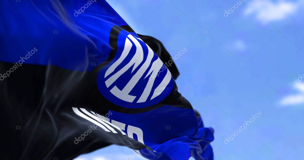 Milan, Italy, July 2022: The flag of Inter Football Club waving in the wind. Inter is a professional football club based in Milan, Italy