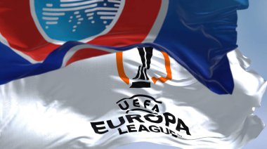 Budapest HUN, July 2022: Flags with UEFA and UEFA Europa League waving in the wind. Europa League is an annual football club competition for european clubs
