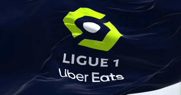 Paris, FRA, July 2022: Close-up of the Ligue 1 flag waving in the wind. Ligue 1 is a French professional league for men association football clubs. Illustrative editorial