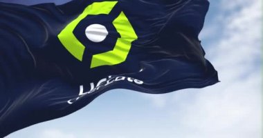 Paris, FRA, July 2022: Close-up of the Ligue 1 flag waving in the wind. Ligue 1 is a French professional league for men association football clubs. Illustrative editorial. Seamless loop in slow motion
