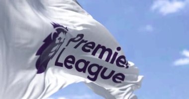London, ENG, July 2022: Close-up of the Premier League flag waving in the wind. Premier League is the top level of the English football league system. Seamless loop in slow motion. Selective focus