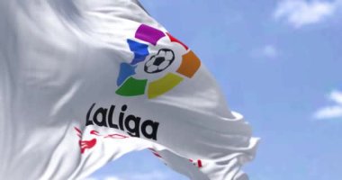 Madrid, SPA, July 2022: Close-up of the La Liga flag waving in the wind. La Liga is the men top professional football division of Spain. Illustrative editorial. Seamless loop in slow motion