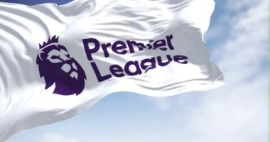 London, ENG, July 2022: the Premier League flag waving in the wind. Premier League is the top level of the English football league system. Illustrative editorial. Seamless loop in slow motion