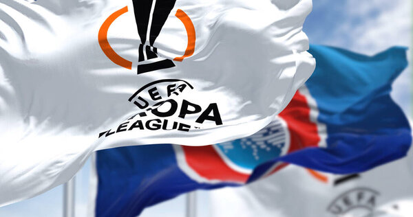Budapest HUN, July 2022: Flags with UEFA and UEFA Europa League waving in the wind. Europa League is an annual football club competition for european clubs