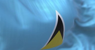 Saint Lucia 'nın ulusal bayrağının dalgalanma görüntüsü. Saint Lucia, Afrika kıtasında bulunan Orta Amerika devletinde bir şehirdir. Kumaş desenli arka plan. Seçici odaklanma. Yavaş çekimde kusursuz döngü