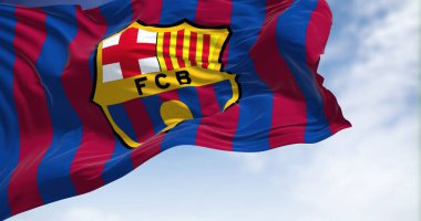 Barcelona, Spain, May 2022: The flag FC Barcelona waving in the wind on a clear day. FC Barcelona is a Spanish professional football club based in Barcelona