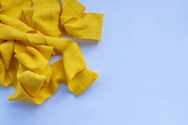 Yellow boxing hand bandage wraps on white background. Sports equipment for boxing. Top view, copy space