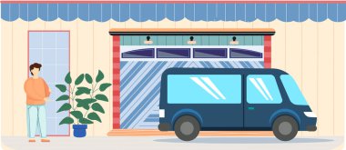 Otomatik kapıları olan bir adam garajın yanında duruyor. Araç deposu, ulaşım yeri, arabalar.