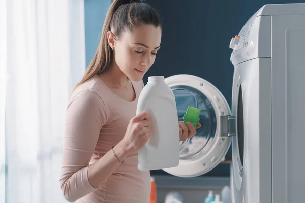 Woman Smelling Laundry Detergent Washing Clothes — Stock Photo, Image