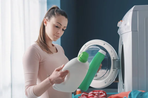 Woman Comparing Laundry Detergents Doing Laundry Home — Stock Photo, Image