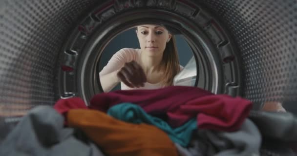 Woman smelling fresh soft laundry — Stock Video