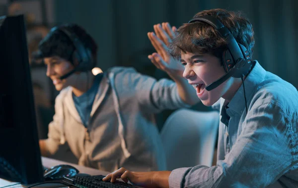 Cheerful Friends Playing Online Video Games Together Winning Give High — 스톡 사진