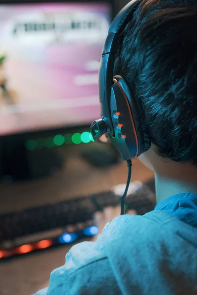 Young Gamer Wearing Headset Playing Online Multiplayer Video Games His — Stock Photo, Image