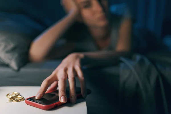 Sad Young Woman Checking Her Phone Night She Has Smartphone — Foto de Stock