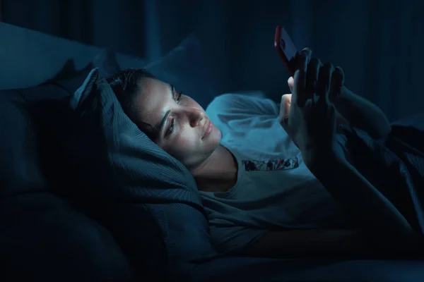 Young Woman Lying Her Bed Night Connecting Her Smartphone She — Photo