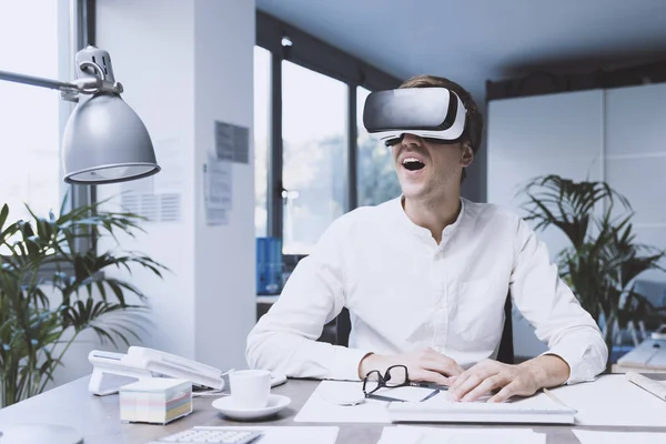 Cheerful Businessman Sitting Desk Interacting Virtual Reality — Stockfoto