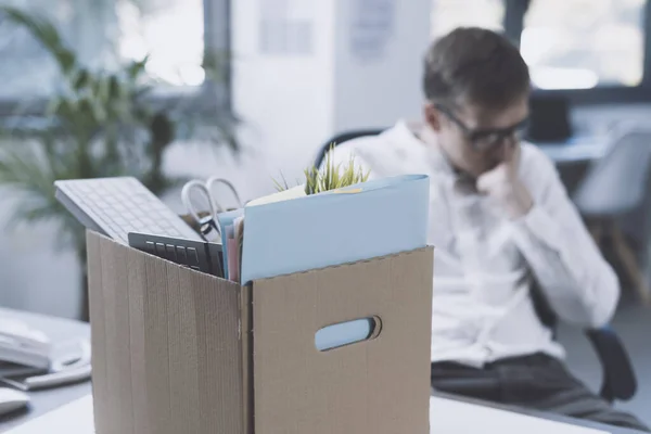 Fired Office Worker Packing His Belongings Box Leaving Office Sitting — Fotografie, imagine de stoc