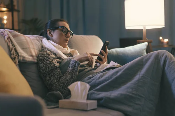 Sick Young Woman Resting Couch Home Connecting Online Using Her — ストック写真