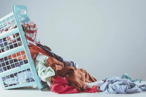 Messy Clothes Falling Laundry Basket — Stockfoto