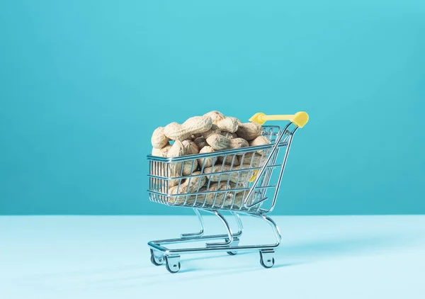 Tiny Shopping Cart Filled Peanuts Grocery Shopping Concept — Stockfoto