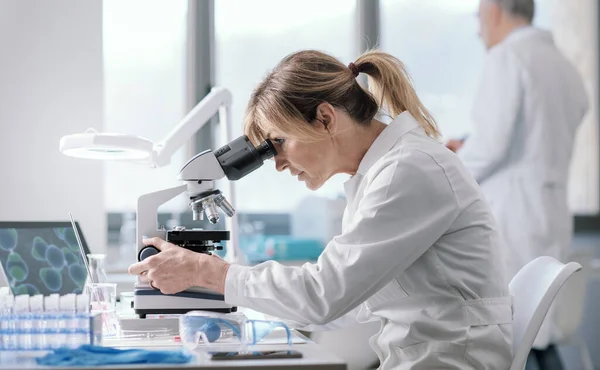 Woman Working Medical Laboratory She Using Microscope — Stockfoto