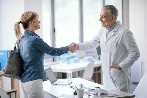 Professional Doctor Welcoming Patient His Office Smiling Shaking Hands — 图库照片