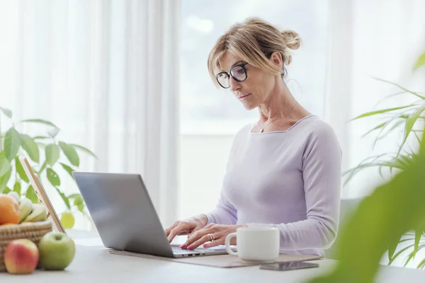 Mature Woman Working Home She Connecting Online Using Her Laptop — 图库照片