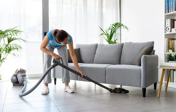 Young Woman Cleaning Her Home She Vacuuming Floor — Stok fotoğraf