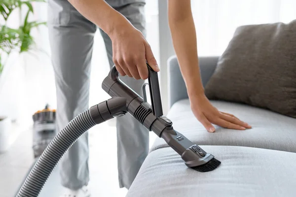 Young Woman Cleaning Couch Living Room She Vacuuming Cushions Using — ストック写真