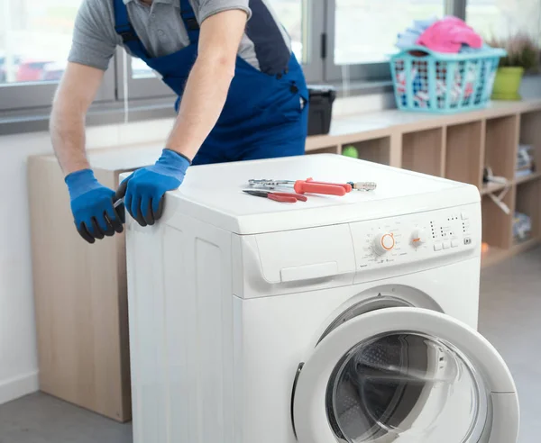 Professional Repairman Fixing Broken Washing Machine Home Repair Concept — Stock Photo, Image