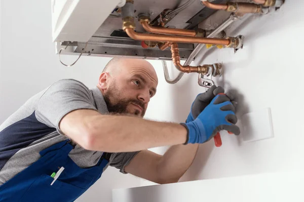 Professional Engineer Installing Natural Gas Boiler Home Checking Pipes — Fotografia de Stock