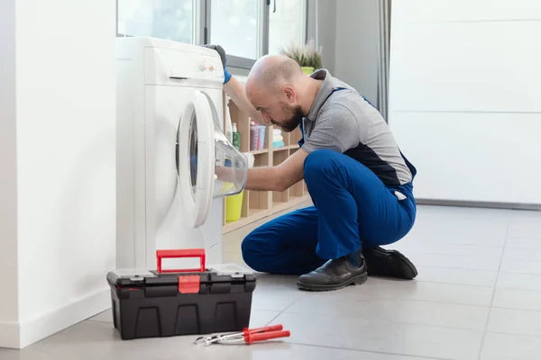 Professional Technician Repairing Washing Machine Checking Gasket Door Seal — ストック写真