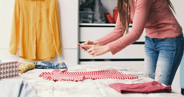 Woman Taking Pictures Her Clothes Bed She Wants Sell Her —  Fotos de Stock