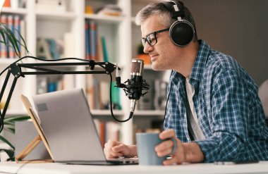 Professional speaker recording a live podcast for his channel, communication and media concept