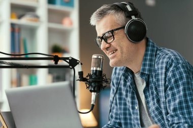 Professional speaker recording a live podcast for his channel, communication and media concept