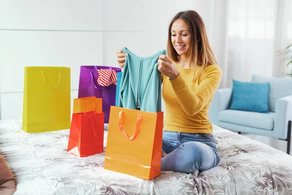 Happy Woman Sitting Bed Home Checking Her New Purchases — Fotografie, imagine de stoc